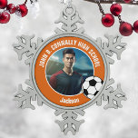 Orange Soccer Player Photo High School Spirit Snowflake Pewter Christmas Ornament<br><div class="desc">This cool customized high school soccer player photo gift features white typography of your team and player name on an orange Christmas ornament with a soccer ball. Personalize with your student's photograph and class year as a proud futbol parent for a commemorative keepsake.</div>
