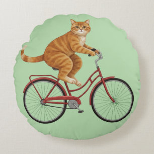 Orange Tabby Cat on a Bicycle Round Cushion