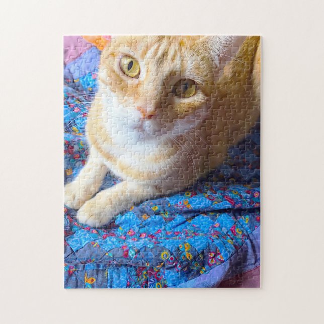 Orange tabby on quilt jigsaw puzzle (Vertical)