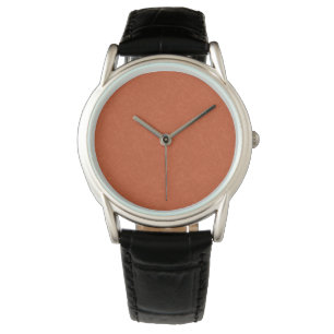 Orange textured surface with swirling pattern watch