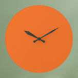 Orange Tiger Solid Color Large Clock<br><div class="desc">Orange Tiger Solid Color. This bold and energetic hue captures the spirit of vibrancy and excitement. It's an intense, almost electric orange with just the right amount of warmth and brightness. Its boldness makes it a standout color that is sure to capture attention. This dynamic hue works beautifully with a...</div>