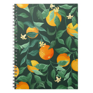 Orange trees, branches with flowers on a green bac notebook