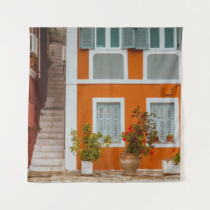 ORANGE WHITE AND GRAY CONCRETE BUILDING TAPESTRY
