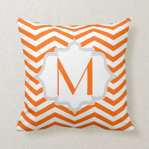 Orange, white chevron zigzag pattern cushion