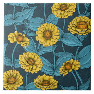 Orange Zinnia flowers, green leaves on dark green Tile