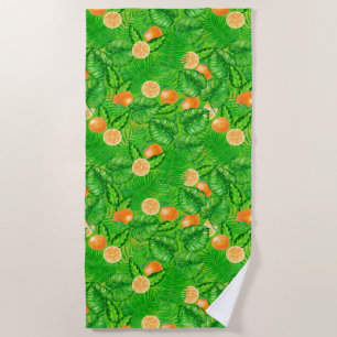 Oranges and tropical leaves beach towel