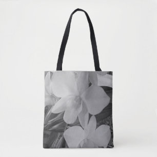 Orchids in grayscale on all-over printed tote bag