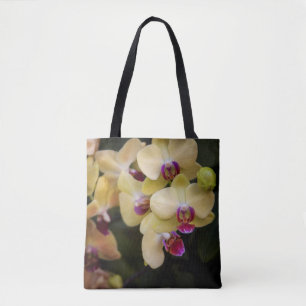 Orchids of pink and yellow tote bag