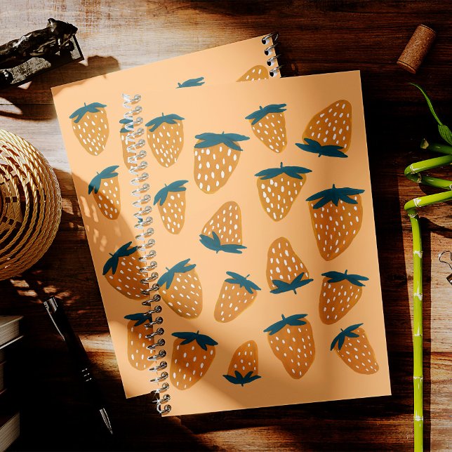 Organic summer strawberries in orange planner (Creator Uploaded)