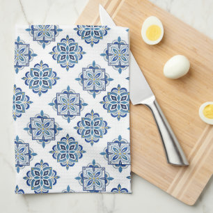 Ornament embroidered blue on white tea towel