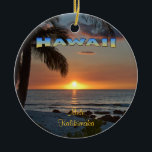 Ornament: Waikoloa Sunset #1 (Circle) Ceramic Tree Decoration<br><div class="desc">A circular ceramic ornament showing the almost-setting sun illuminating the bottom of the surrounding clouds with an orange glow. Add in some palm trees in silhouette and a faintly visible coral beach, and you have the makings of a winning sunset! Mele Kalikimaka means "Merry Christmas" in the Hawaiian language. Text...</div>