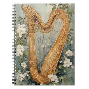 ornamental harp surrounded by white flowers notebook