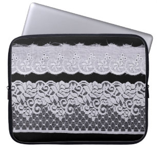 Ornamental white lace, isolated black background. laptop sleeve