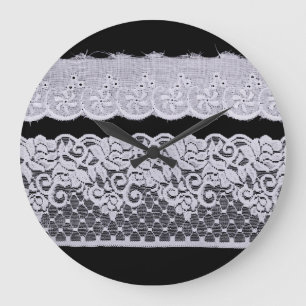 Ornamental white lace, isolated black background. large clock