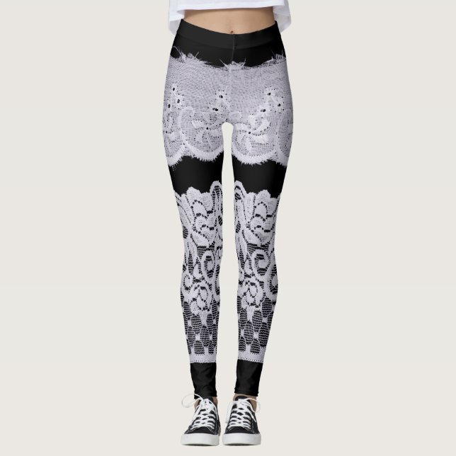 Ornamental white lace, isolated black background. leggings (Front)