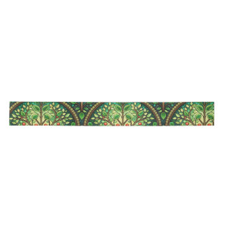 Ornate design featuring green and gold symmetrical satin ribbon