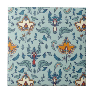 Ornate floral pattern on a pale blue background tile