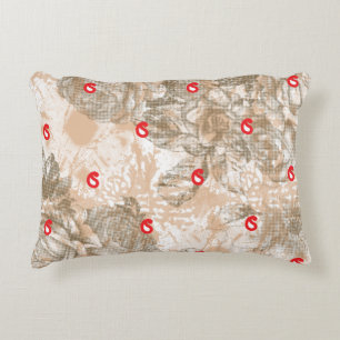 Ornate textile design featuring floral patterns in decorative cushion