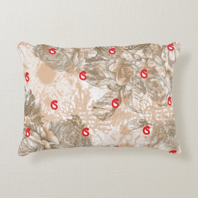 Ornate textile design featuring floral patterns in decorative cushion (Front)
