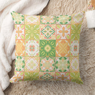 Ornate tiles in green and yellow cushion
