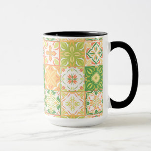 Ornate tiles in green and yellow mug