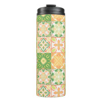 Ornate tiles in green and yellow