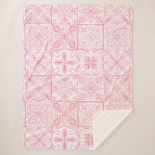 Ornate tiles in pink sherpa blanket