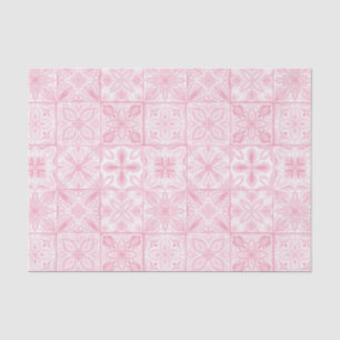 Ornate tiles in pink tissue paper