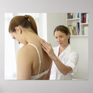 Osteopath treating patient. poster