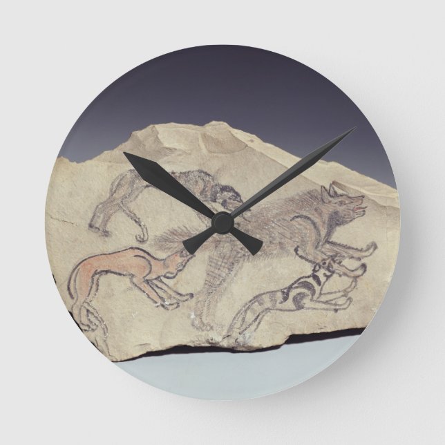Ostracon depicting a dog chasing a hyena (limeston round clock (Front)