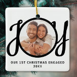 Our 1st Christmas Engaged Photo Keepsake<br><div class="desc">This keepsake First Christmas Engaged photo ornament is decorated with the word JOY in black,  stylish script typography. Easily customisable.</div>