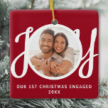 Our 1st Christmas Engaged Photo Red Keepsake Ceramic Ornament<br><div class="desc">This keepsake First Christmas Engaged photo ornament is decorated with the word JOY in stylish script typography on a red background. Easily customisable.</div>