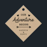 Our adventure begins hearts and arrows favour tags<br><div class="desc">A wedding favour tag featuring your names at the bottom. The design says "Our adventure begins" with love hearts and an arrow. A cute romantic design for your wedding day.</div>