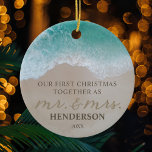 Our First Christmas as Mr & Mrs Beach Ceramic Tree Decoration<br><div class="desc">Custom 1st christmas as newlyweds ornament featuring a tropical sandy shoreline,  turquoise blue sea,  the cute saying "our first christmas together as mr. & mrs." partly written in the sand,  your family name,  and the year.</div>