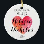 Our first Christmas engaged or together ornament<br><div class="desc">Our 1st Christmas engaged or together ornament featuring a cute watercolor heart. Personalised with your names in a cute typographic script font.</div>