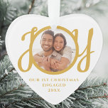 Our First Christmas Engaged Photo Heart-Shaped Ornament<br><div class="desc">This keepsake heart-shaped First Christmas Engaged photo ornament is decorated with the word JOY in stylish gold script typography. Easily customisable.</div>