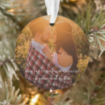 Our First Christmas Engaged Simple Photo Ornament<br><div class="desc">Did you get engaged this year? Add a memory to your tree with this modern acrylic ornament featuring a simple design with the words, "Our First Christmas Engaged" along with your names in a white handwritten script and the year over your favourite photo. Add the same photo to both sides...</div>