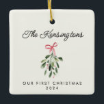 Our First Christmas Personalised Newlywed Photo Ceramic Ornament<br><div class="desc">Celebrate your first holiday season together with the Our First Christmas Personalised Newlywed Custom Photo Ceramic Ornament! Featuring a modern mistletoe painting alongside your favourite photo, this ornament combines romance with a contemporary design, making it a truly special wedding keepsake. Perfect for your own tree or as a thoughtful gift...</div>