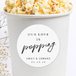 Our Love is Popping Popcorn Wedding Favour Classic Round Sticker<br><div class="desc">Custom-designed popcorn wedding favour stickers featuring "Our Love is Popping" modern black and white hand script design.</div>