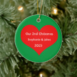 Our Second Christmas Together 2023 Cute Red Heart  Ceramic Tree Decoration<br><div class="desc">Personalised names and printed with cute red heart design in solid green background. Feel free to customise by adding your own texts,  names or photos. You can add your photo on the back side of the ornament easily!
The colour of the background can also be changed as you want.</div>