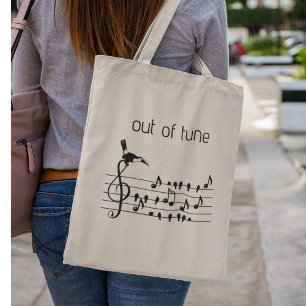 Out of Tune, toucan joining songbirds Tote Bag