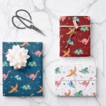 Outer Space Dinosaur Holiday Christmas Wrapping Paper Sheet<br><div class="desc">Celebrate this holiday and birthdays combined with your love of dinosaurs with this cute graphic pattern featuring cute outer space dinos pattern.</div>