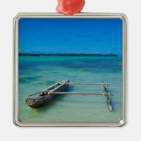 Outrigger Canoe In Shallow Ocean