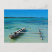 Outrigger Canoe In Shallow Ocean