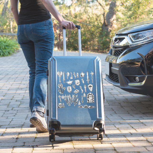 over 25 weapon and dungeon themed stickers (Suitcase Insitu)