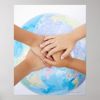 Overlapping hands and a globe poster