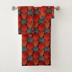 Overlapping red hexagons and 'grey star' bath towel set