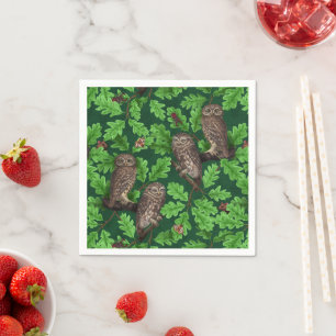 Owls in the forest on dark green napkin