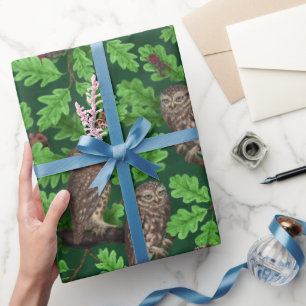 Owls in the forest on dark green wrapping paper