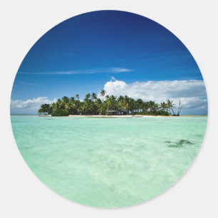Pacific island with palm trees round sticker